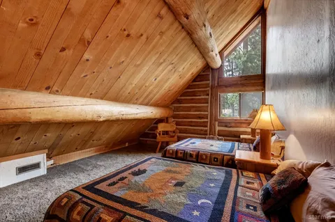 a backyard of a house with seating space