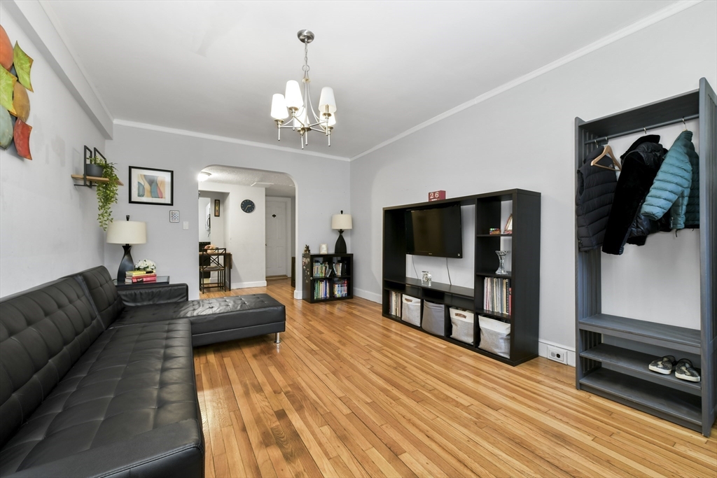 1490 Beacon Street, Unit 1A Brookline, MA 02446 - Photo 11 of 15 a living room with furniture and a flat screen tv