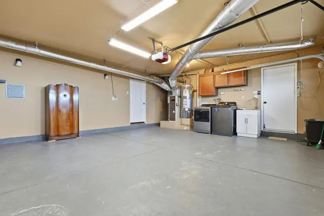a view of livingroom with washer and dryer