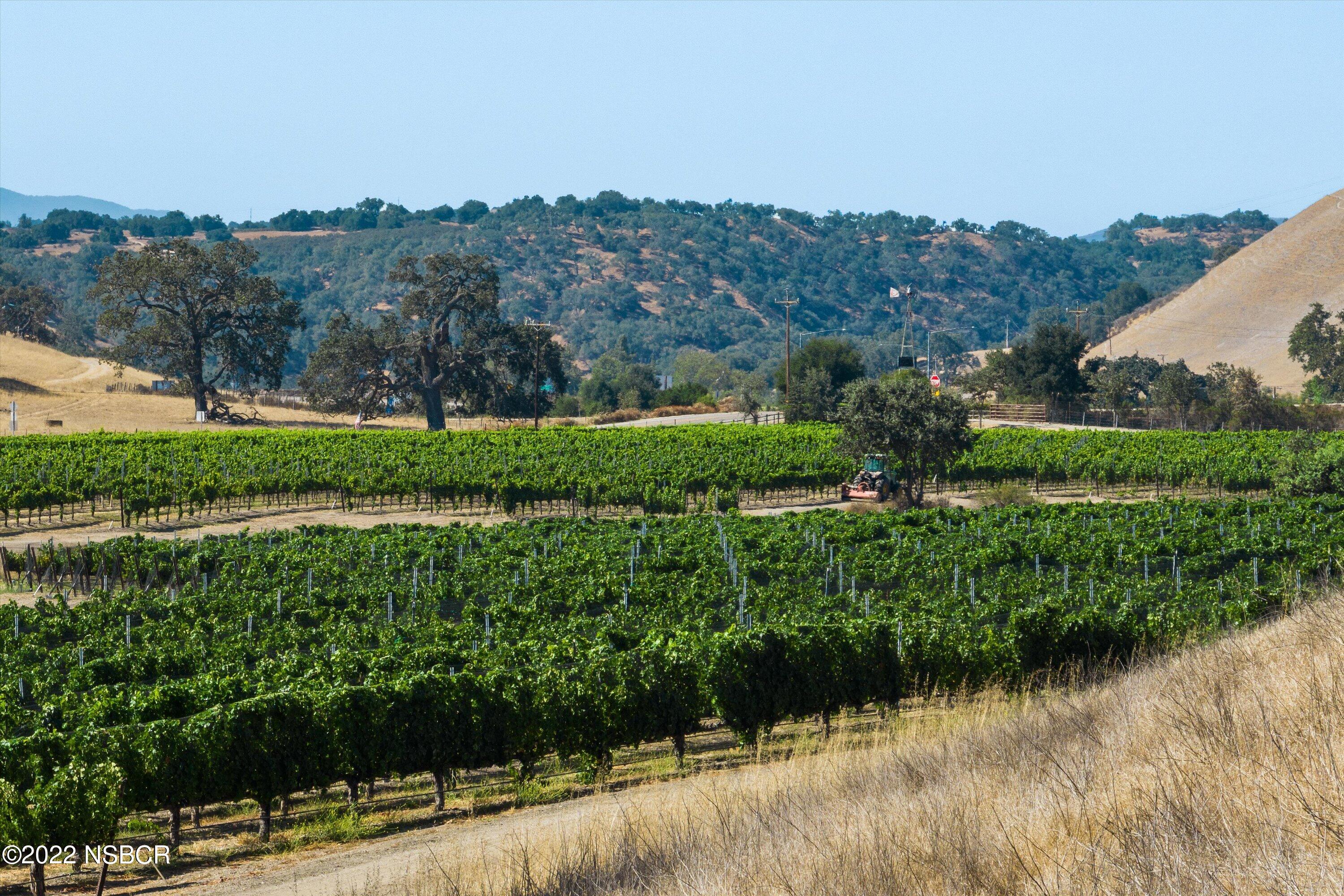 1 Zaca Station Road Los Olivos, CA 93441 - Photo 4 of 28 a view of a lake with a mountain in the background