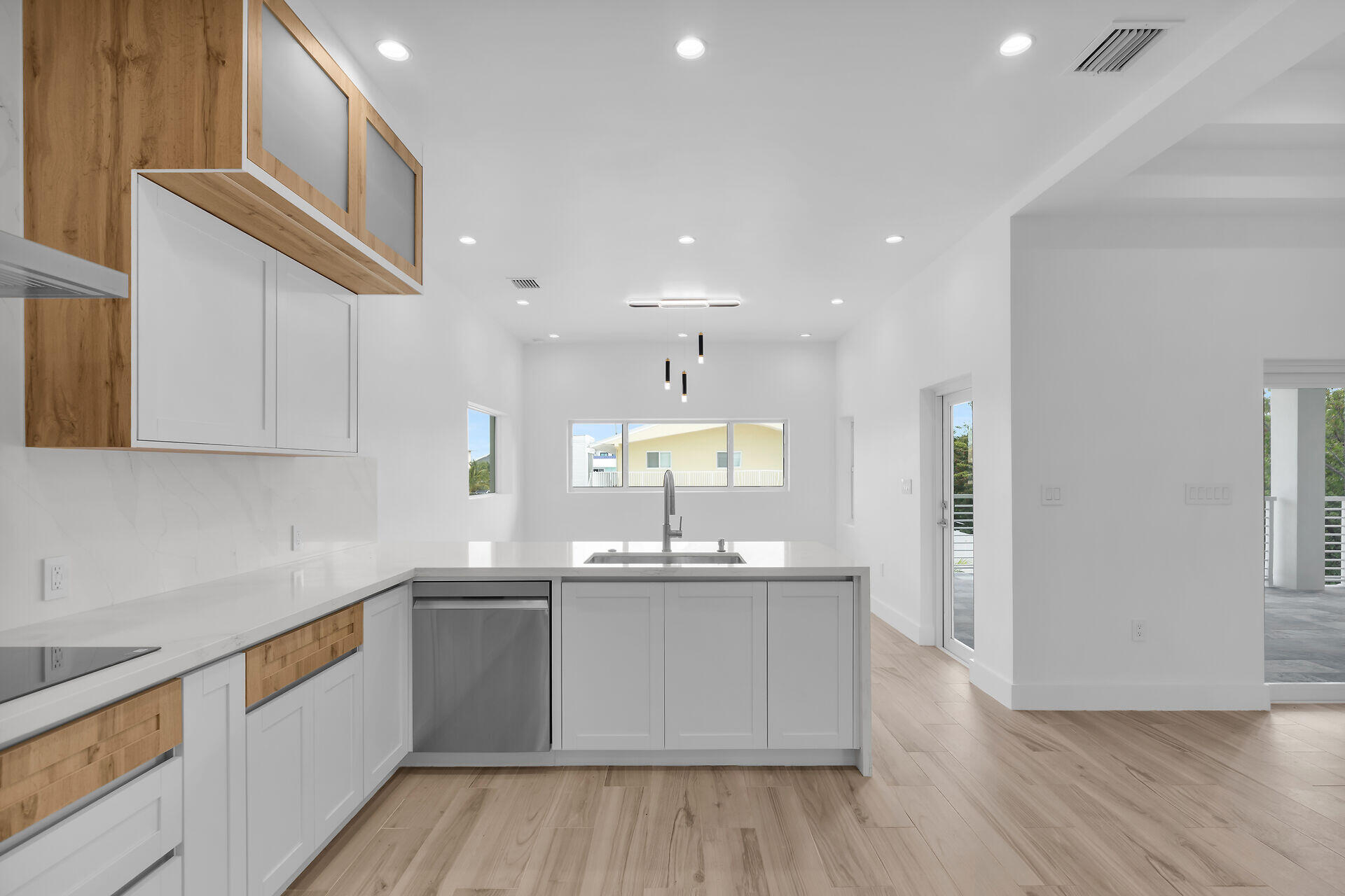 1508 Shaw Drive Key Largo, FL 33037 - Photo 12 of 68 a kitchen with a sink cabinets and wooden floor