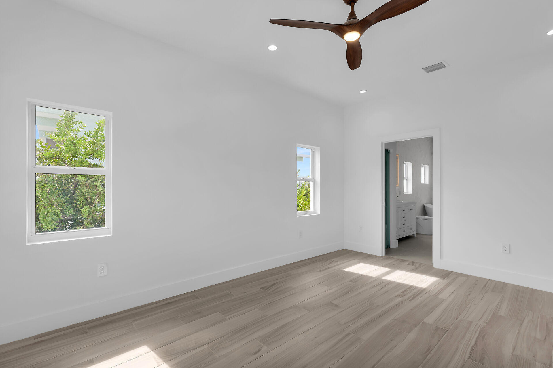 1508 Shaw Drive Key Largo, FL 33037 - Photo 24 of 68 wooden floor in an empty room with a window