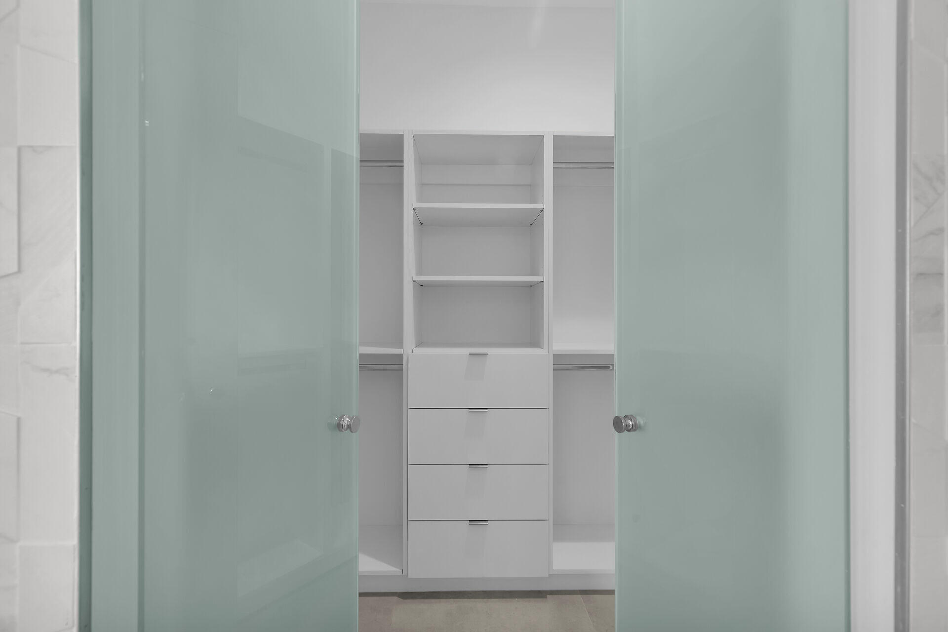 1508 Shaw Drive Key Largo, FL 33037 - Photo 28 of 68 a view of walk in closet with empty racks