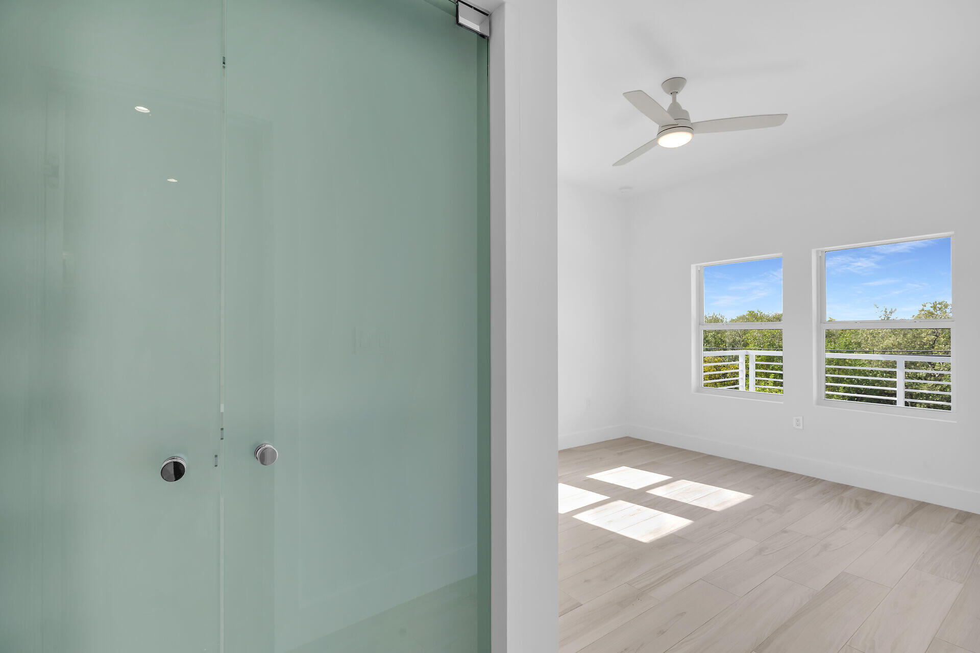 1508 Shaw Drive Key Largo, FL 33037 - Photo 29 of 68 a view of empty room with wooden floor and fan