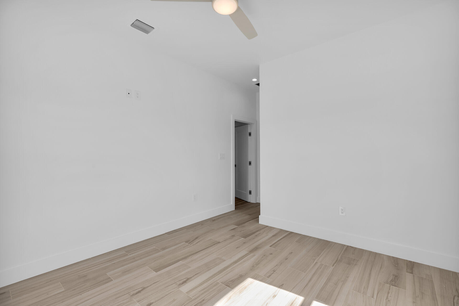 1508 Shaw Drive Key Largo, FL 33037 - Photo 32 of 68 a view of an empty room with wooden floor