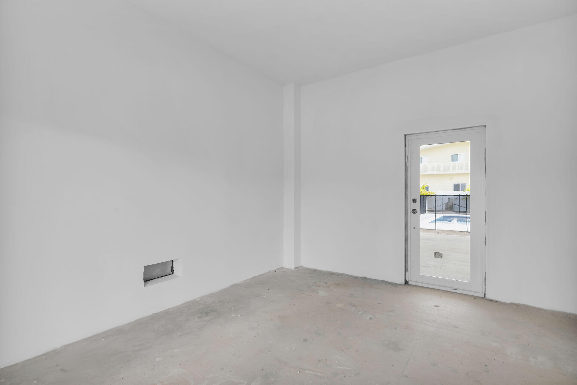 1508 Shaw Drive Key Largo, FL 33037 - Photo 51 of 68 a view of an empty room and a window