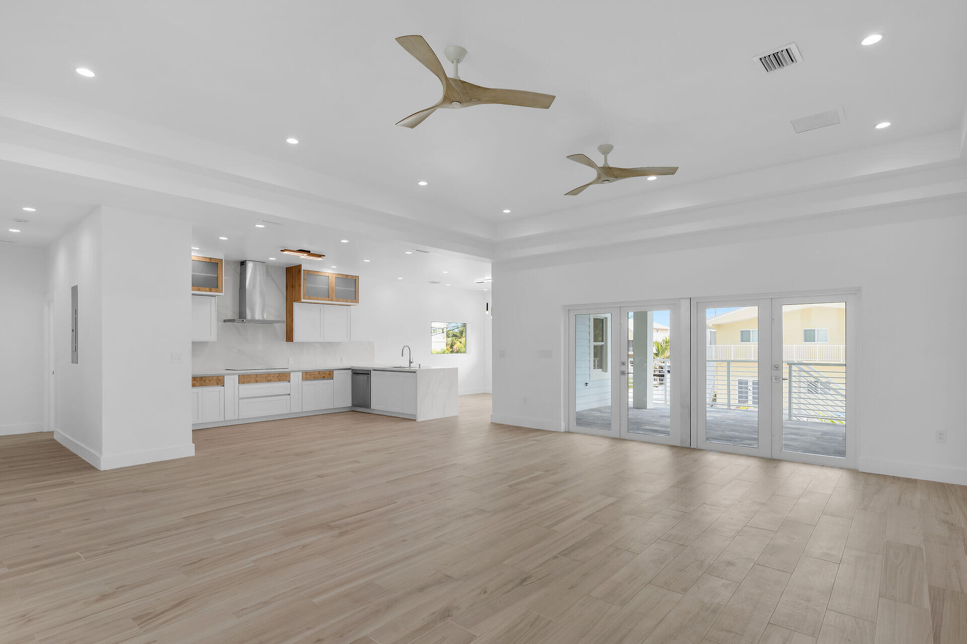 1508 Shaw Drive Key Largo, FL 33037 - Photo 6 of 68 a view of an empty room with a window and wooden floor