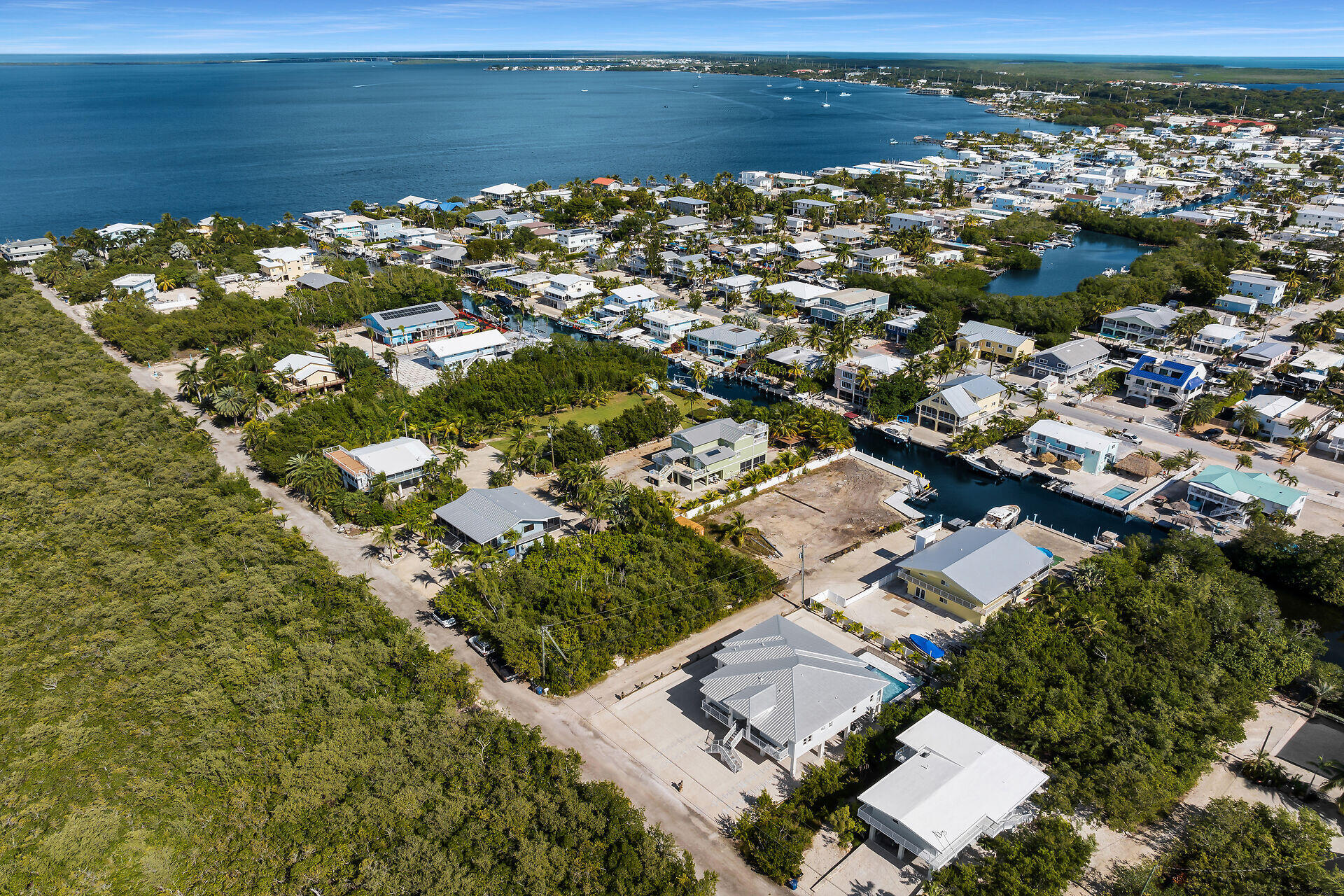 1508 Shaw Drive Key Largo, FL 33037 - Photo 64 of 68 an aerial view of a house with a lake view