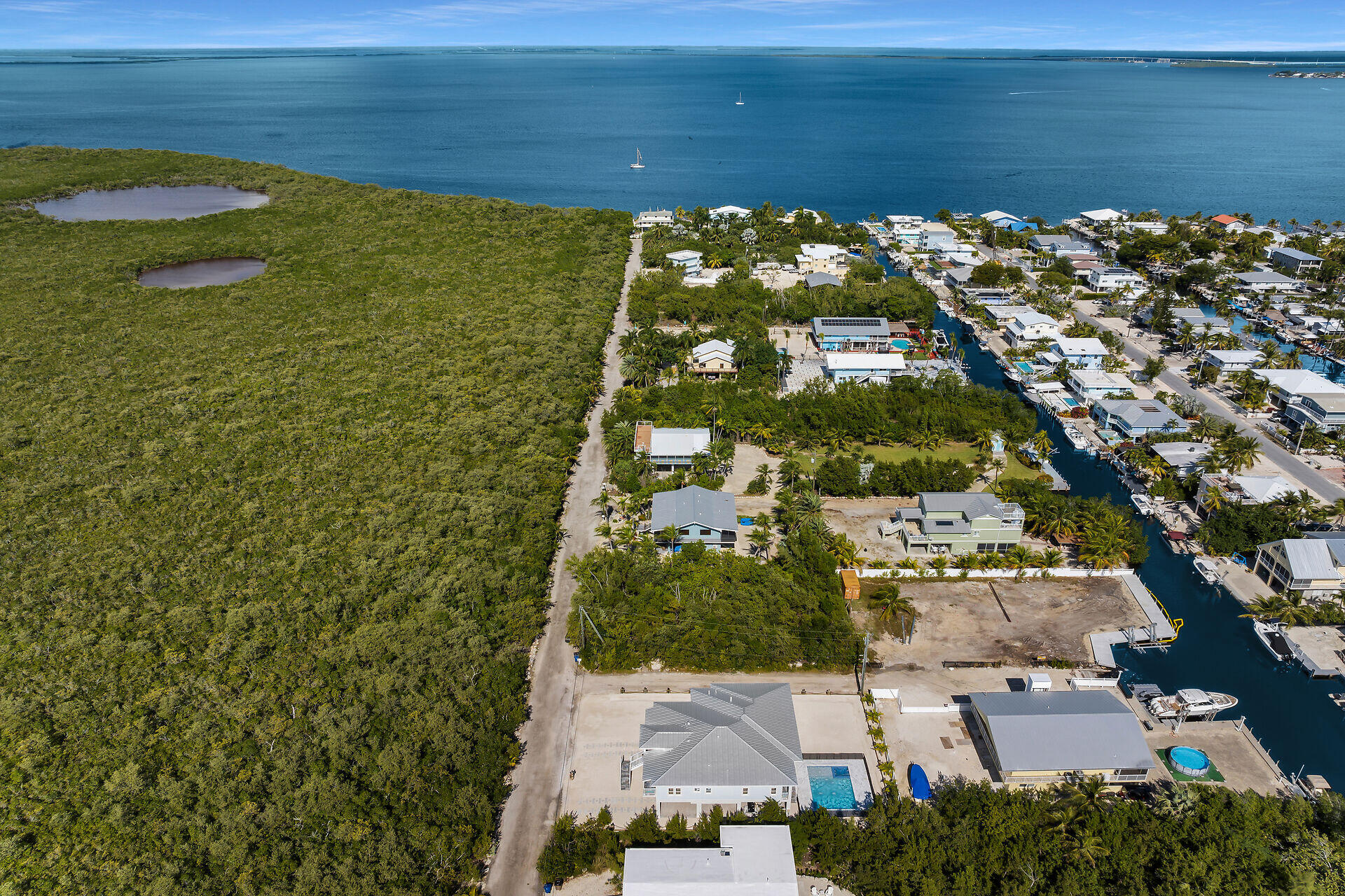1508 Shaw Drive Key Largo, FL 33037 - Photo 65 of 68 a view of a lake with a building in the background