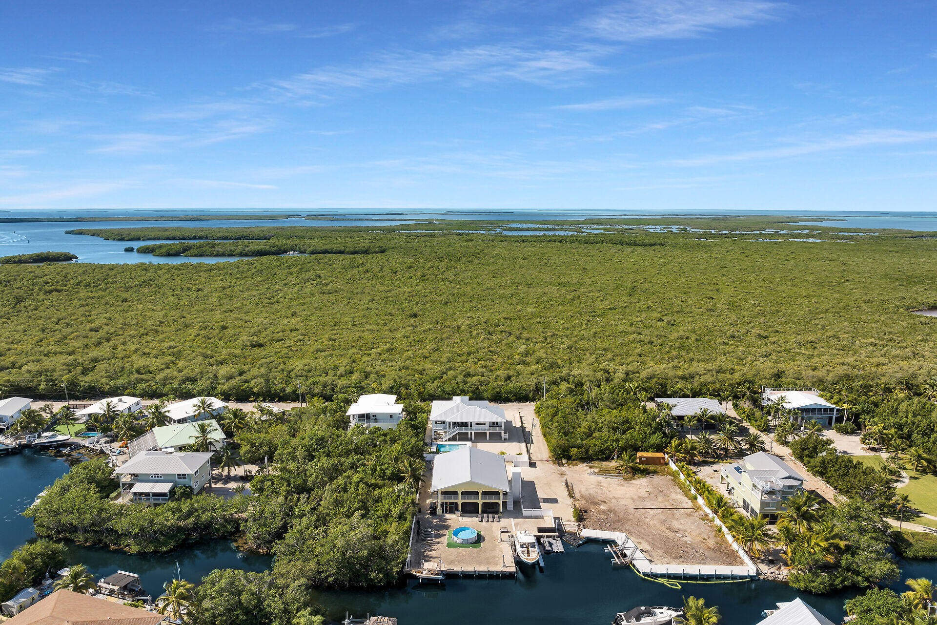 1508 Shaw Drive Key Largo, FL 33037 - Photo 66 of 68 an aerial view of ocean and residential houses with outdoor space