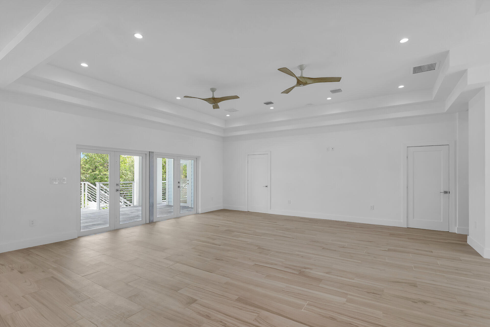1508 Shaw Drive Key Largo, FL 33037 - Photo 9 of 68 wooden floor in an empty room with a window