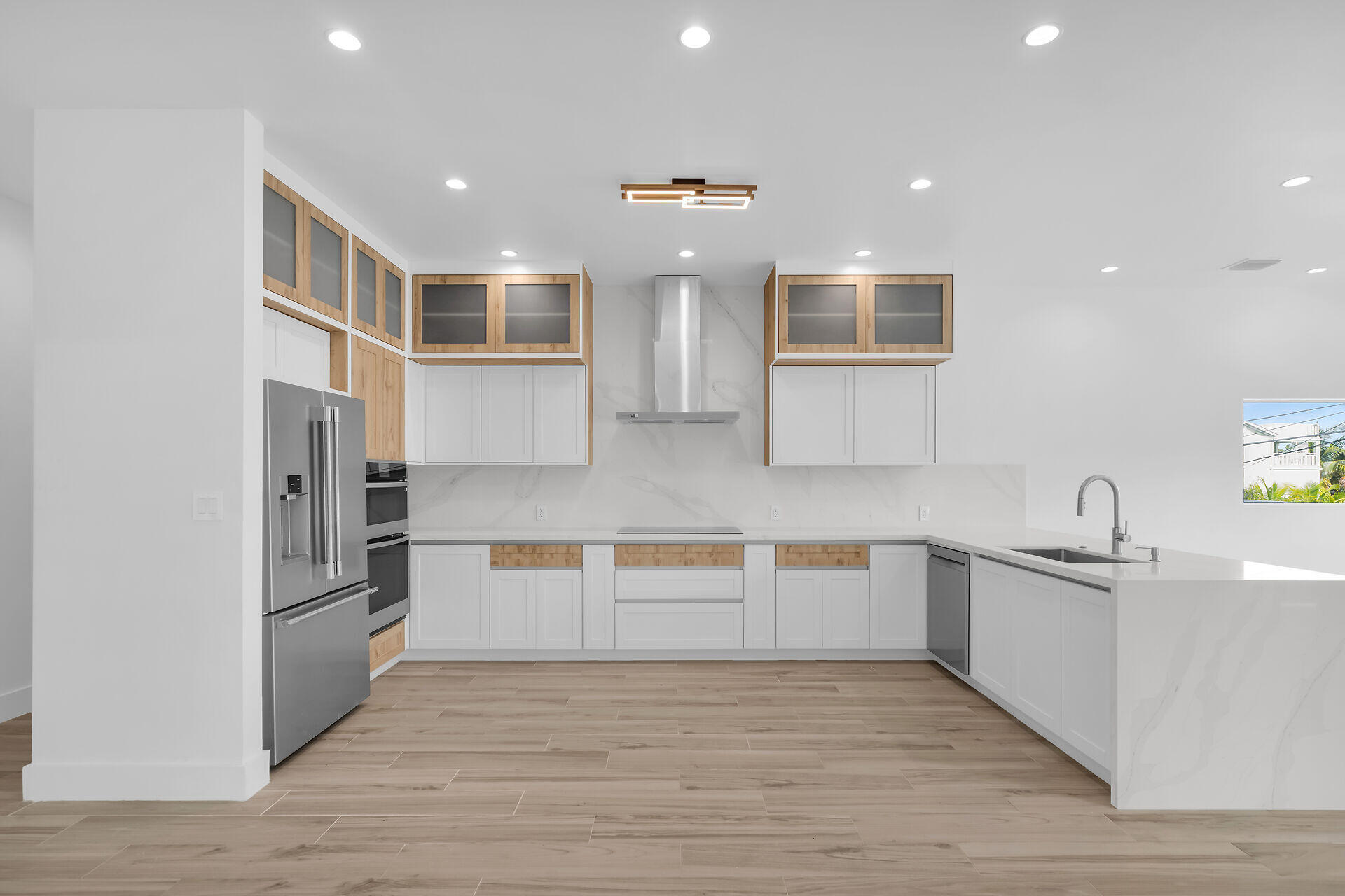 1508 Shaw Drive Key Largo, FL 33037 - Photo 10 of 68 a kitchen with stainless steel appliances granite countertop a refrigerator and a sink