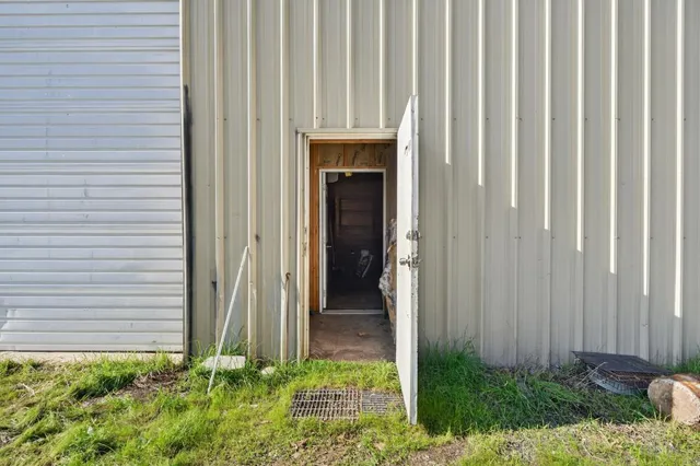 a view of parking garage with furniture