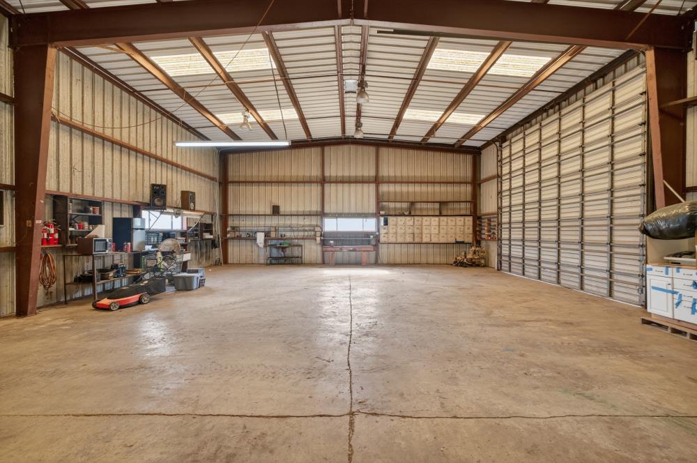 12600 Clay Station Road Herald, CA 95638 - Photo 14 of 31 a view of a garage with storage