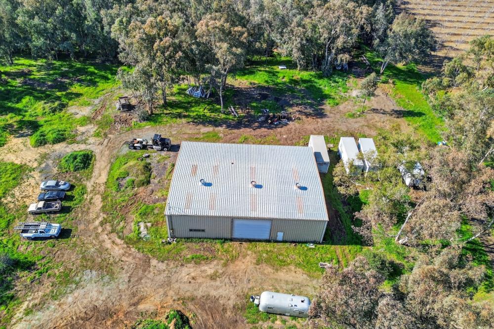 12600 Clay Station Road Herald, CA 95638 - Photo 20 of 31 an aerial view of a house with a yard and garden