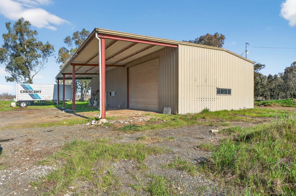 12600 Clay Station Road Herald, CA 95638 - Photo 6 of 31 a view of a house with backyard and tree