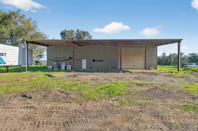 a house view with a garden space