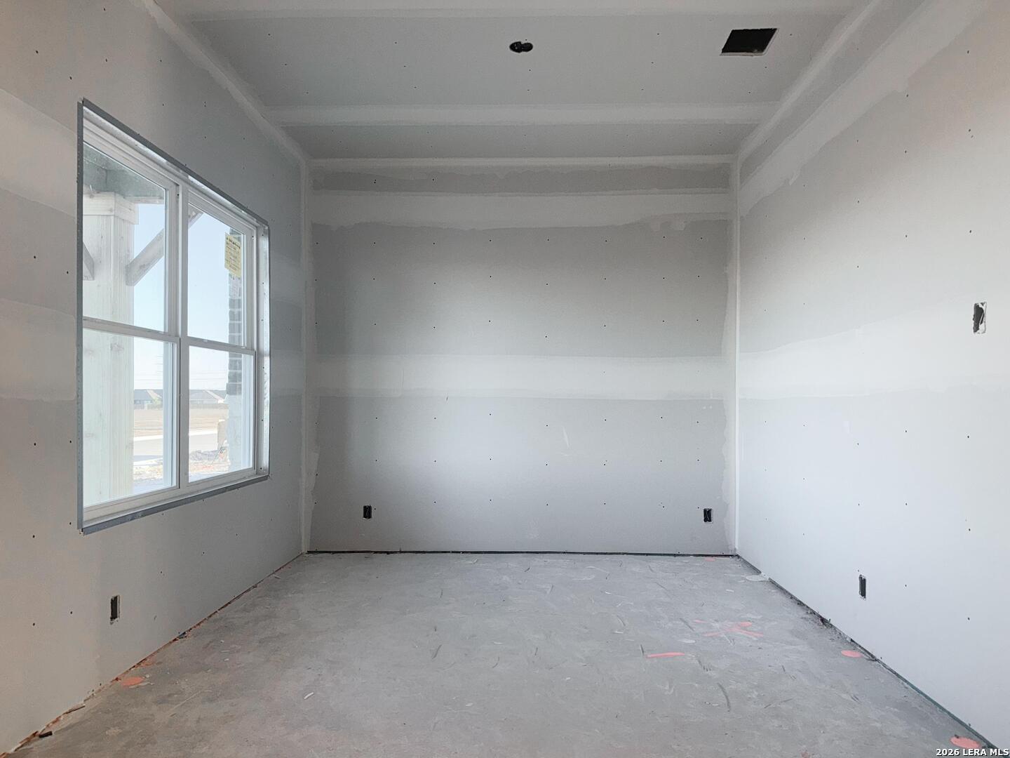 129 Yale Street Seguin, TX 78155 - Photo 11 of 45 an empty room with windows
