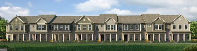 a view of a large house with a yard