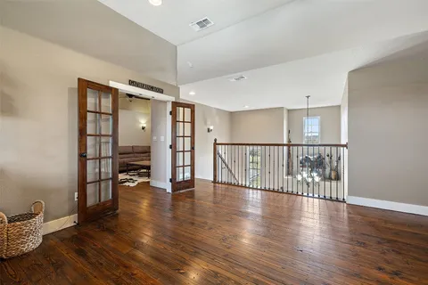 a view of entryway with wooden floor