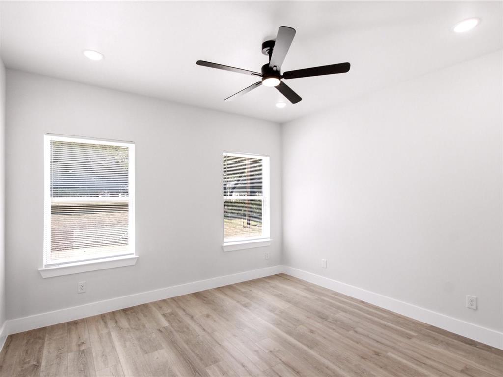 105 Oak Ridge Road Mabank, TX 75156 - Photo 14 of 34 Wood-finish flooring, recessed lighting, and a ceiling fan with integrated lighting