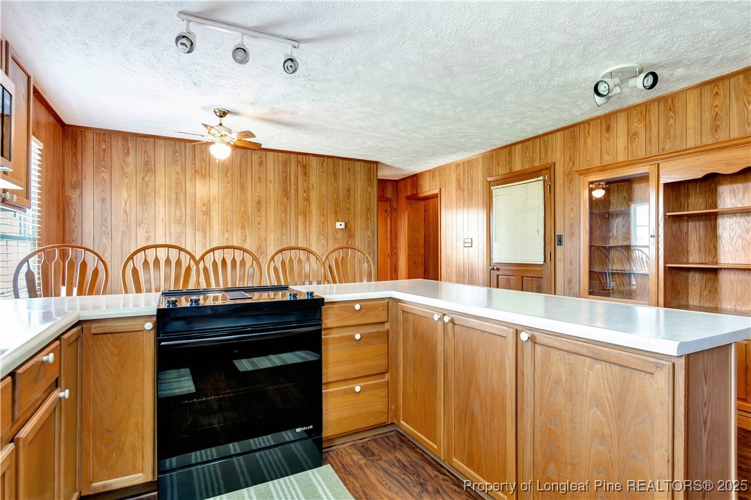 725 Henry Hammond Road Lumberton, NC 28360 - Photo 13 of 42 a kitchen with stainless steel appliances granite countertop a stove and a sink
