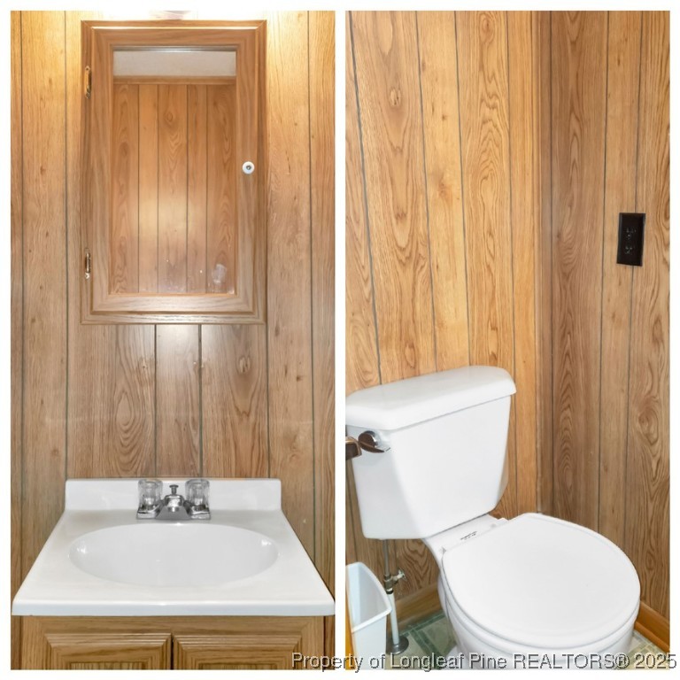 725 Henry Hammond Road Lumberton, NC 28360 - Photo 20 of 42 a bathroom with a sink a toilet and shower curtain