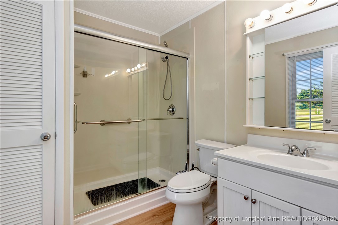 725 Henry Hammond Road Lumberton, NC 28360 - Photo 27 of 42 a bathroom with a sink toilet and shower