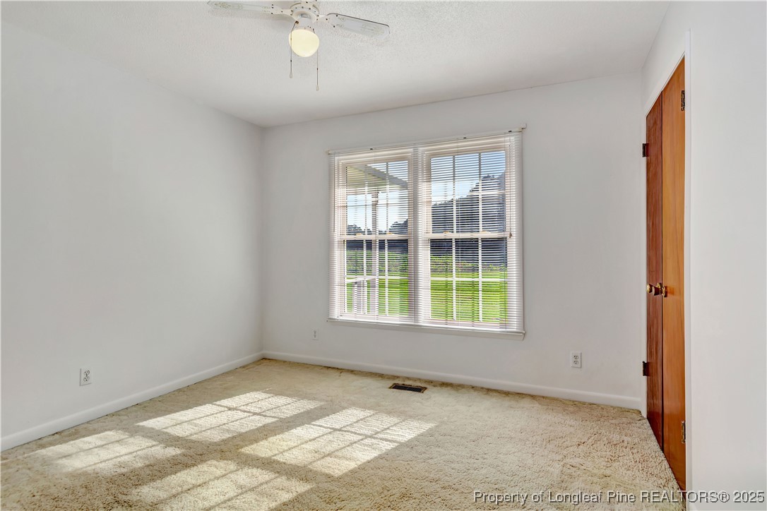 725 Henry Hammond Road Lumberton, NC 28360 - Photo 30 of 42 a view of an empty room with a window