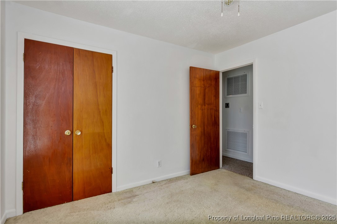 725 Henry Hammond Road Lumberton, NC 28360 - Photo 31 of 42 a view of an empty room