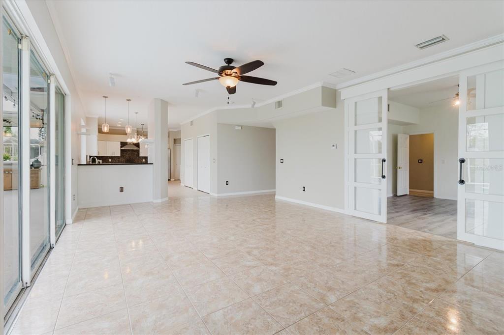 1725 Pink Guara Court Trinity, FL 34655 - Photo 29 of 100 a view of a kitchen with a sink and cabinets