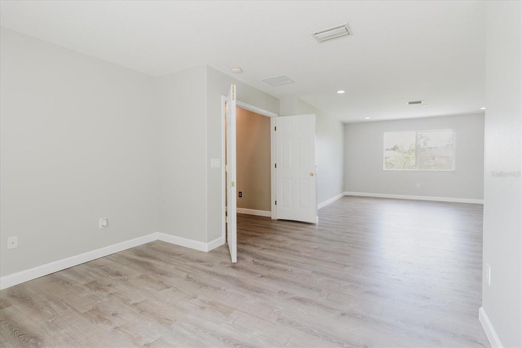 1725 Pink Guara Court Trinity, FL 34655 - Photo 55 of 100 wooden floor in an empty room