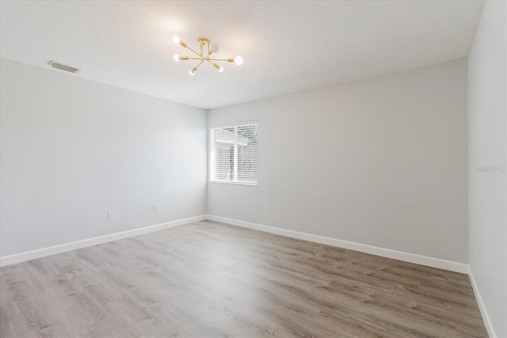 1725 Pink Guara Court Trinity, FL 34655 - Photo 74 of 100 a view of an empty room with a window