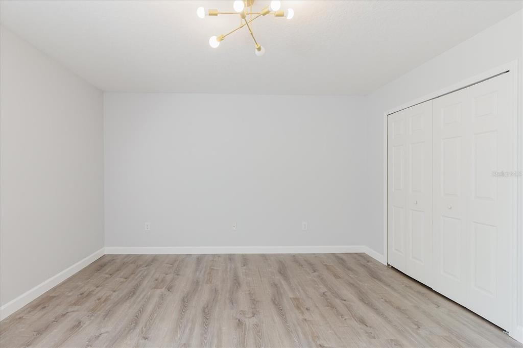 1725 Pink Guara Court Trinity, FL 34655 - Photo 77 of 100 a view of a room with wooden floor