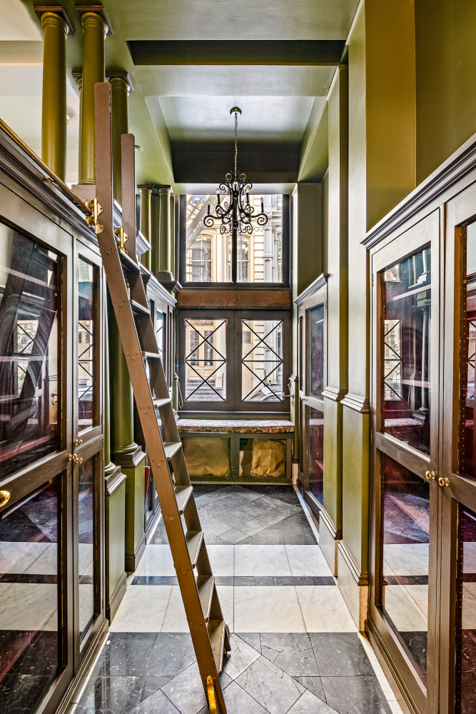 31 Greene Street, Unit 1 Manhattan, NY 10013 - Photo 3 of 7 a room with lots of windows and furniture
