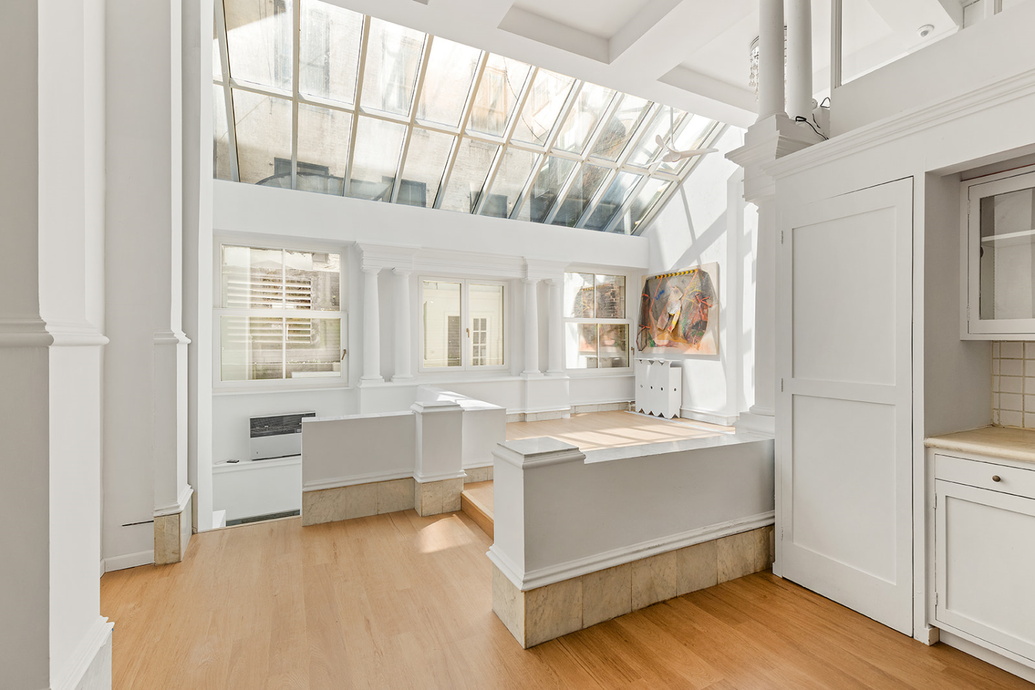 31 Greene Street, Unit 1 Manhattan, NY 10013 - Photo 4 of 7 a view of an empty room with a window