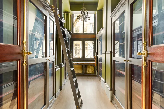 a view of an entryway and livingroom