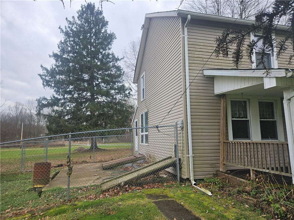 214 Bestwick Road Mercer, PA 16137 - Photo 15 of 19 a view of a house with a yard