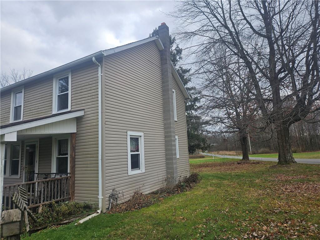214 Bestwick Road Mercer, PA 16137 - Photo 18 of 19 a view of a house with a yard