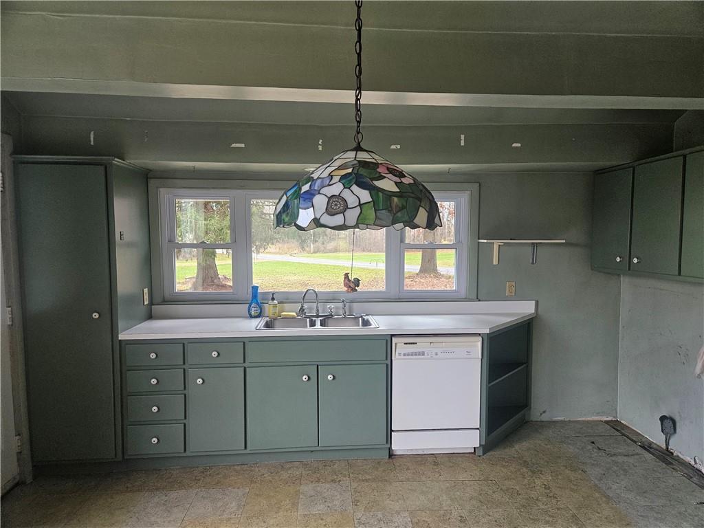 214 Bestwick Road Mercer, PA 16137 - Photo 6 of 19 a room with a sink and chandelier