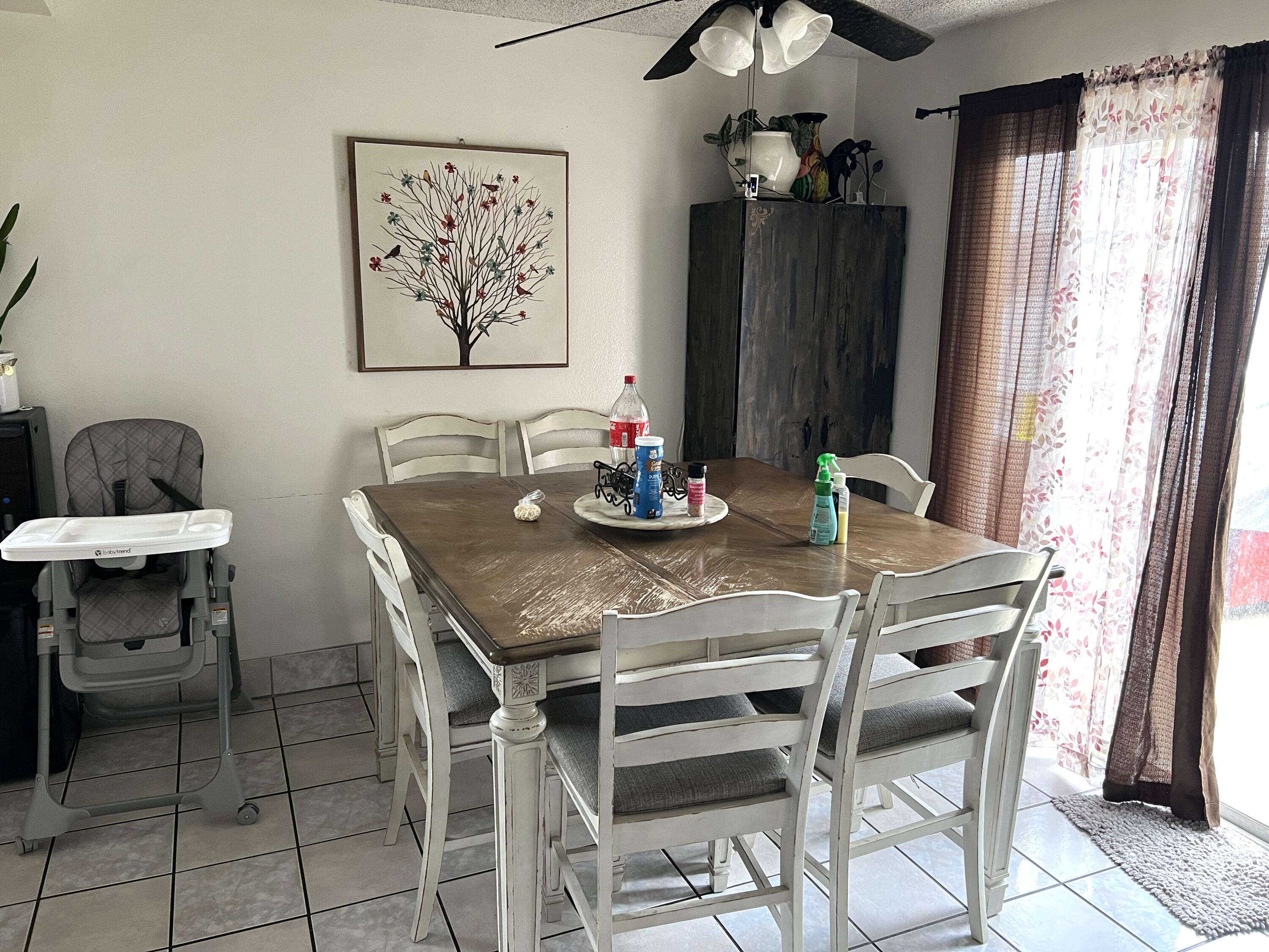 1241 West 7th Street, Unit 1 Oxnard, CA 93030 - Photo 4 of 8 a dining room with furniture and window