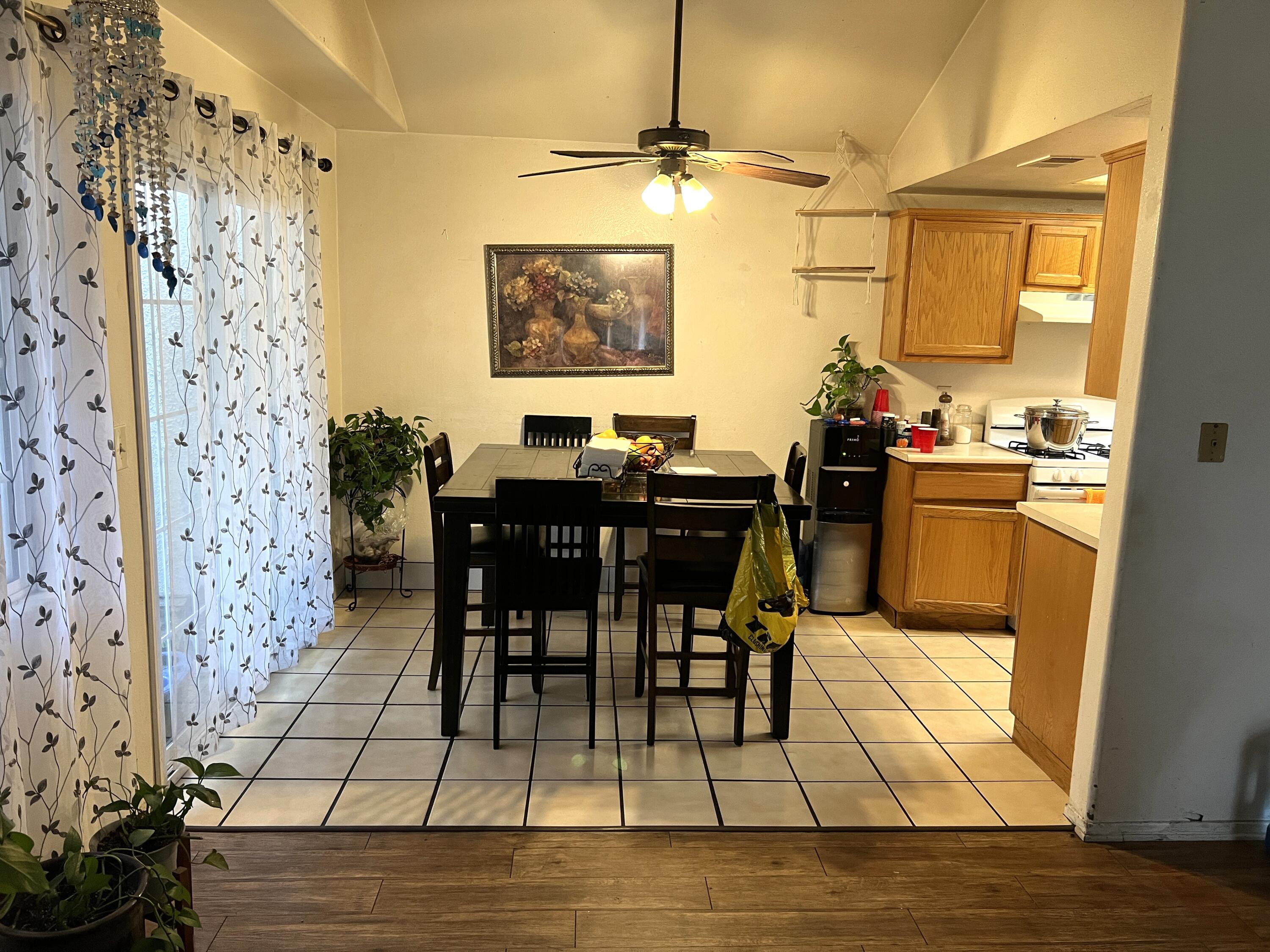 1241 West 7th Street, Unit 1 Oxnard, CA 93030 - Photo 8 of 8 a view of a dining room with furniture