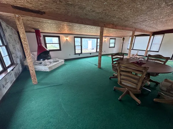 a room with furniture and a flat screen tv