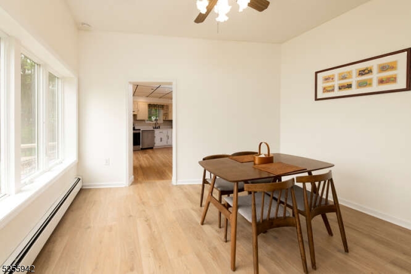 7 Capstan Road West Milford, NJ 07480 - Photo 11 of 33 a view of a workspace with furniture and wooden floor