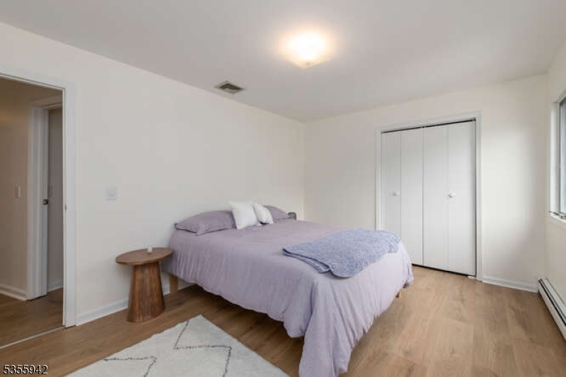 7 Capstan Road West Milford, NJ 07480 - Photo 16 of 33 a bedroom with a bed and a table