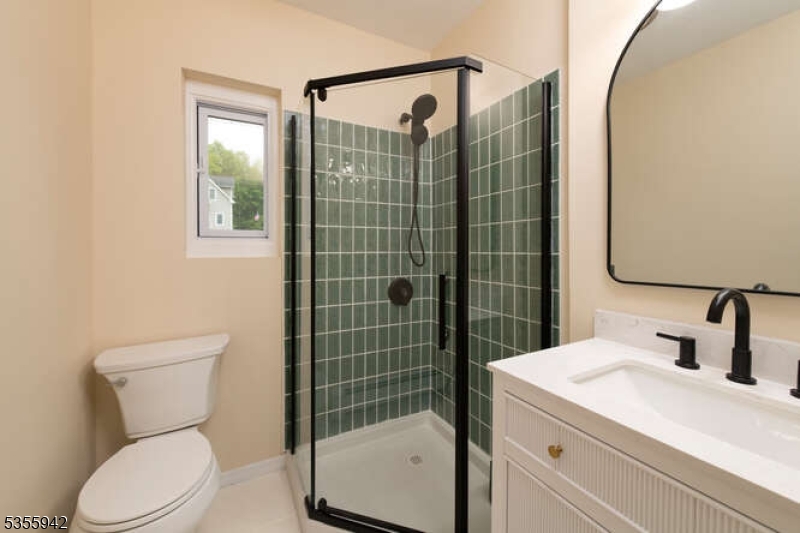 7 Capstan Road West Milford, NJ 07480 - Photo 23 of 33 a bathroom with a sink toilet and shower