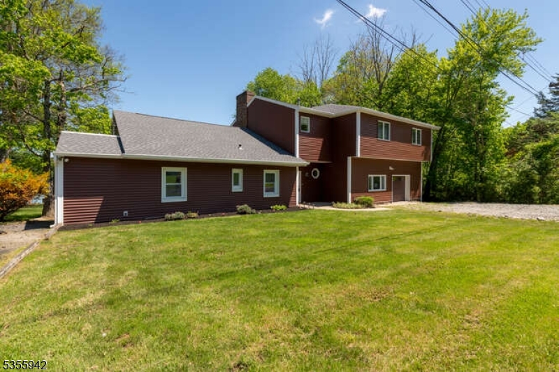 7 Capstan Road West Milford, NJ 07480 - Photo 31 of 33 a front view of a house with a garden