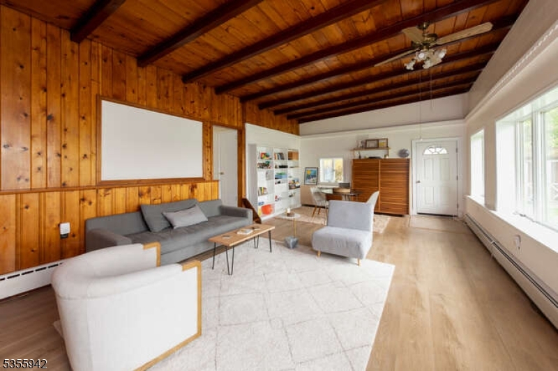 7 Capstan Road West Milford, NJ 07480 - Photo 4 of 33 a living room with furniture and a large window