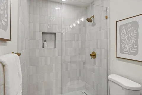 a bathroom with a shower curtain