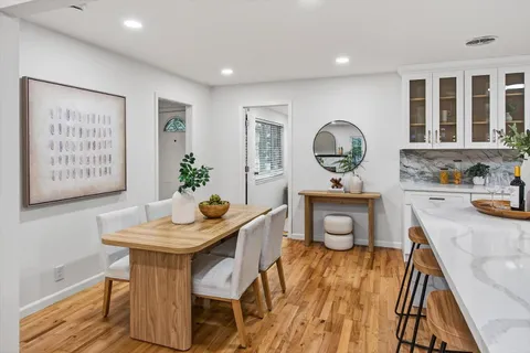 a workspace with furniture and window